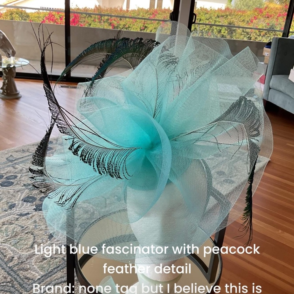 Elegant Light Blue Fascinator with Peacock Feather Detail